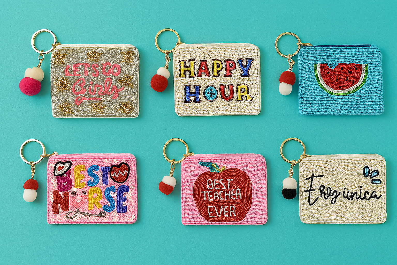Set of colorful keychains with various phrases on a teal background
