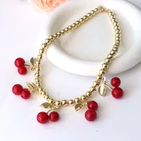 CHERRY RESIN COPPER 18K GOLD PLATED MULTI CHARMS NECKLACES J-12228N